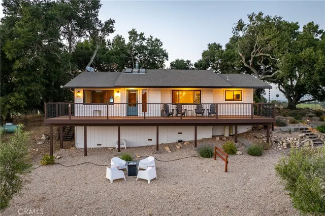 a bedroom with bed and a night stand