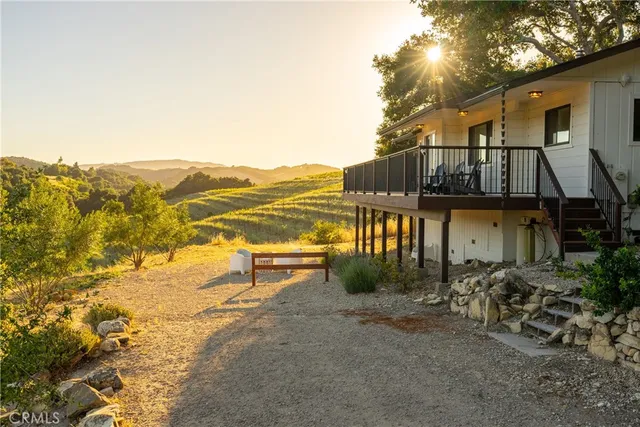 a view of a house with a ocean view