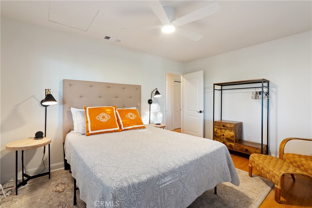 115 Booker Road Templeton, CA 93465 - Photo 45 of 76 a bed room with a bed and a chair