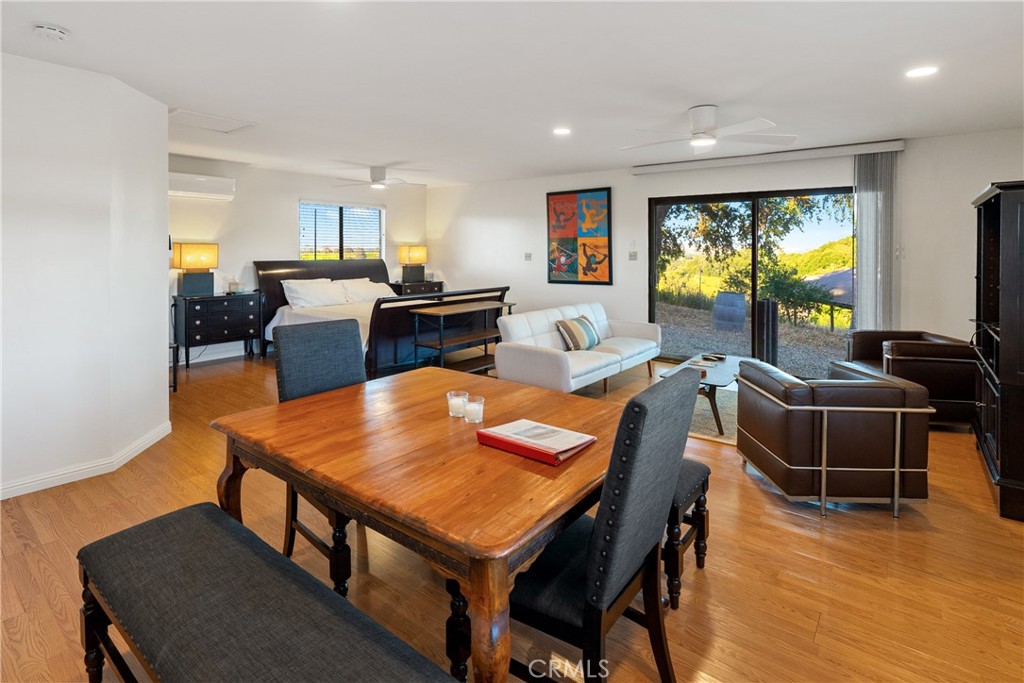 115 Booker Road Templeton, CA 93465 - Photo 56 of 76 a living room with furniture a flat screen tv and next to a window