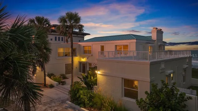 a bedroom with a bed window and a flat screen tv