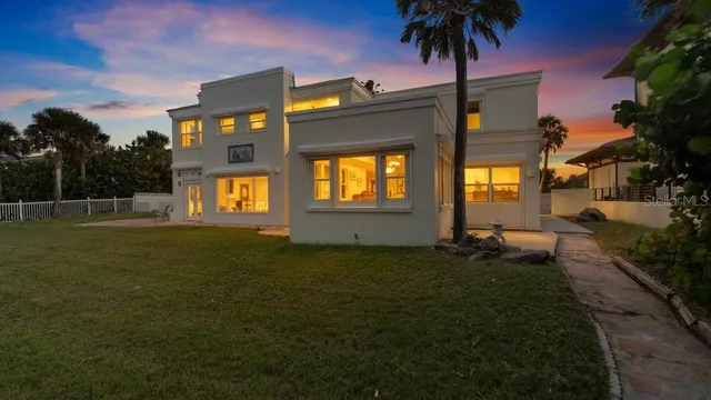 a large bedroom with a bed and a large closet