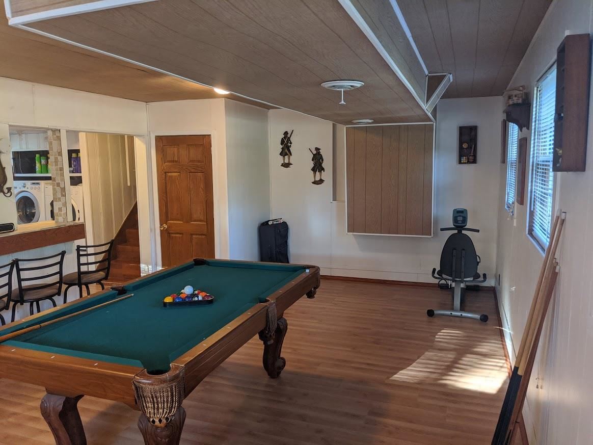 4769 Pelley Road Rockford, IL 61102 - Photo 18 of 33 a room with pool table and windows