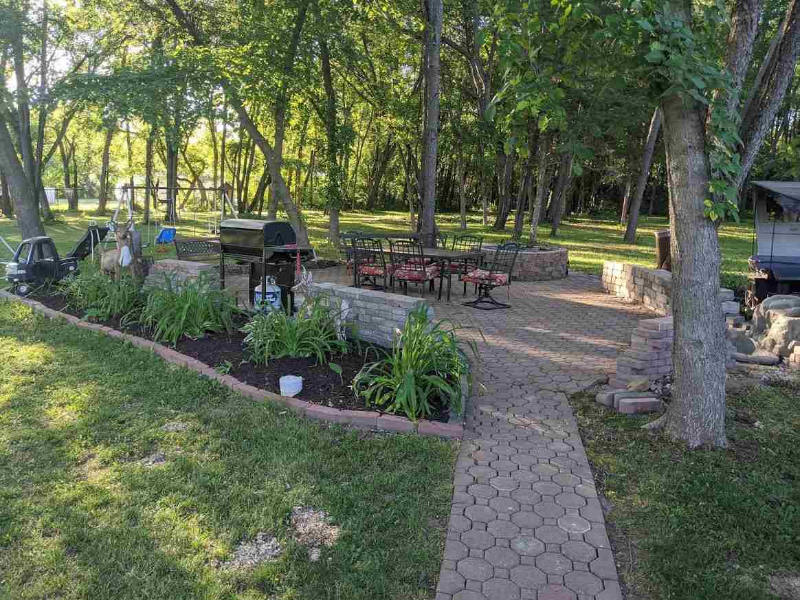 4769 Pelley Road Rockford, IL 61102 - Photo 27 of 33 a view of a backyard with sitting area
