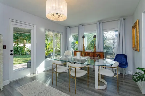 a view of a dining room with furniture window and outside view