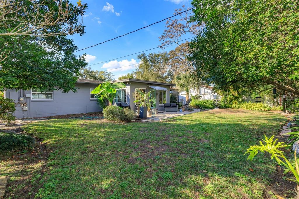 1105 Strathmore Drive Orlando, FL 32806 - Photo 25 of 25 a view of house with a garden