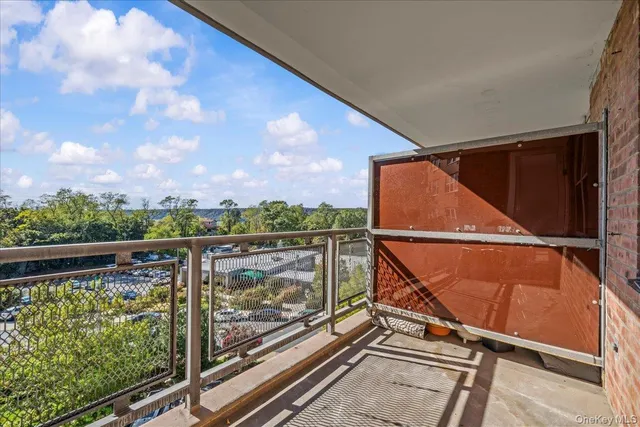a view of balcony with furniture