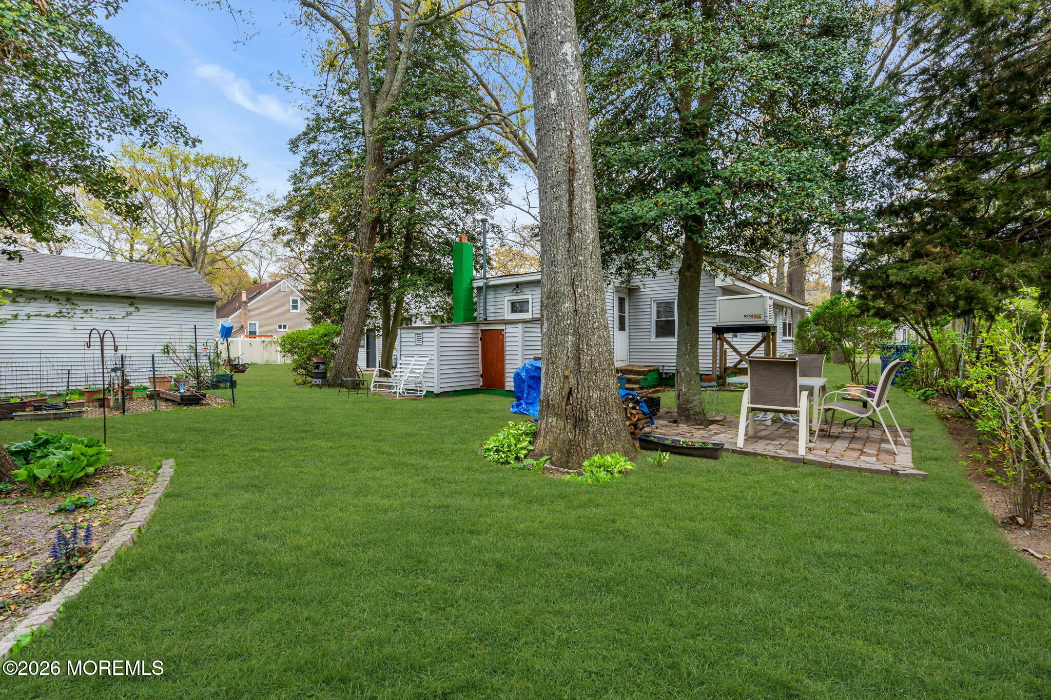 109 Martin Road Toms River, NJ 08753 - Photo 34 of 34 a view of a house with backyard and a tree
