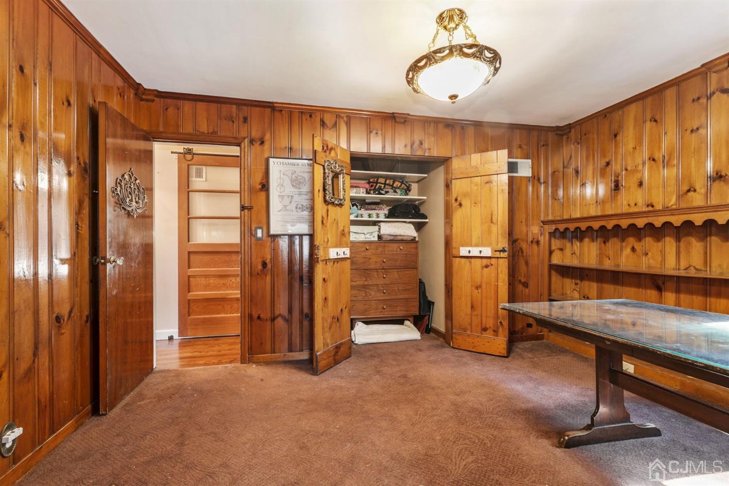424 Chain O' Hills Road Colonia, NJ 07067 - Photo 16 of 36 a view of an empty room with furniture and a window