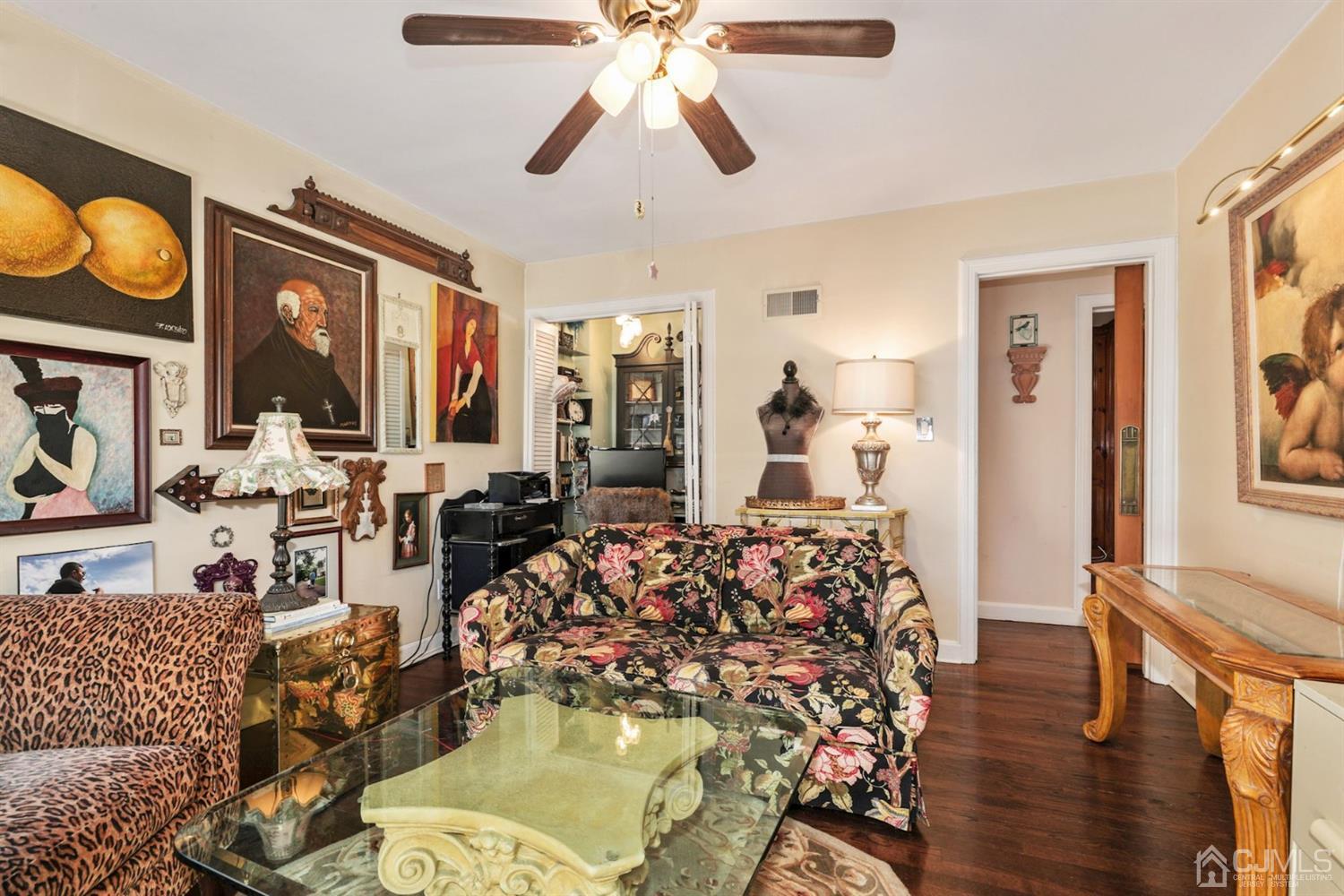 424 Chain O' Hills Road Colonia, NJ 07067 - Photo 28 of 36 a very nice looking living room with wooden floor
