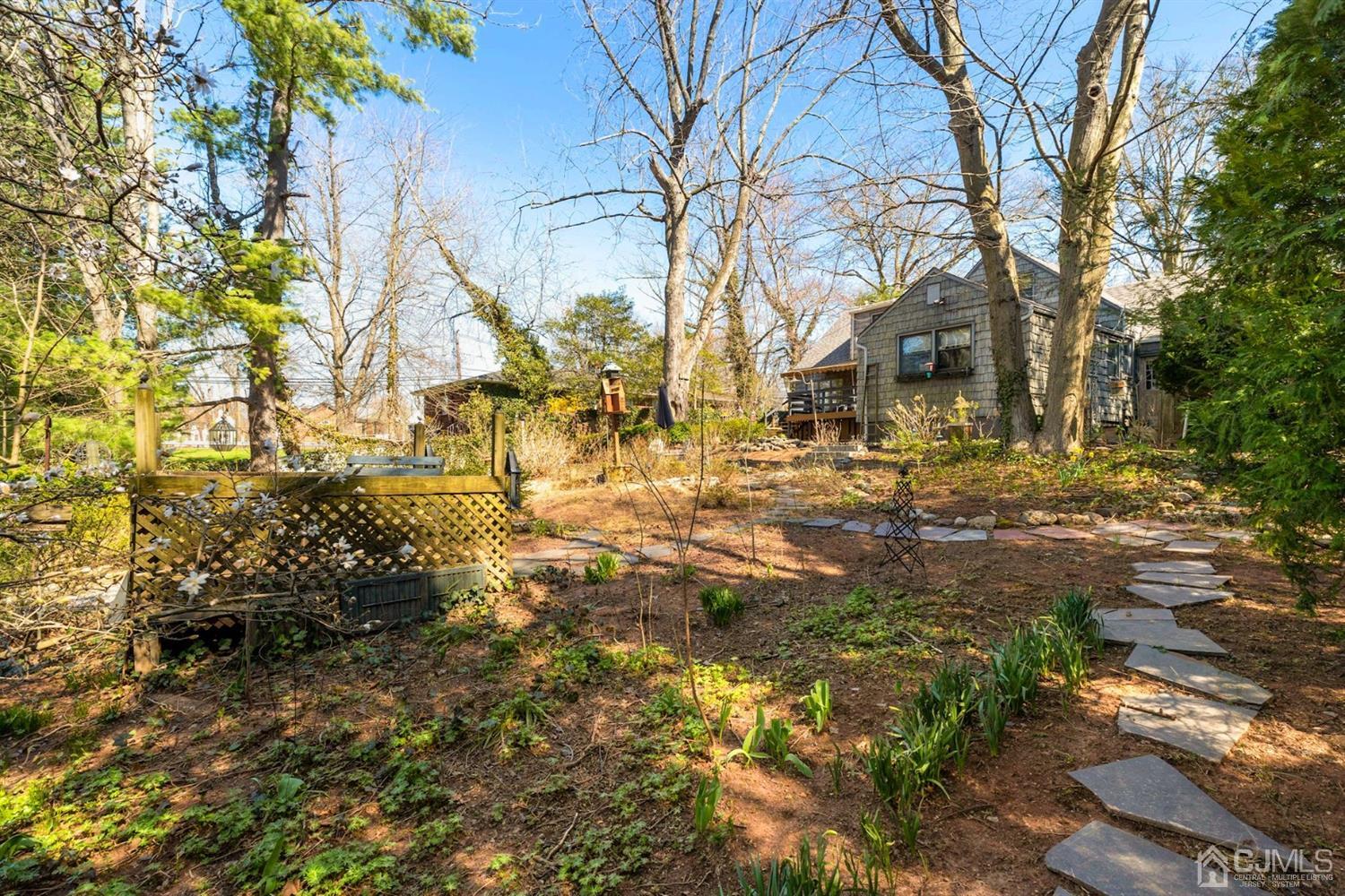 424 Chain O' Hills Road Colonia, NJ 07067 - Photo 6 of 36 a view of building with trees
