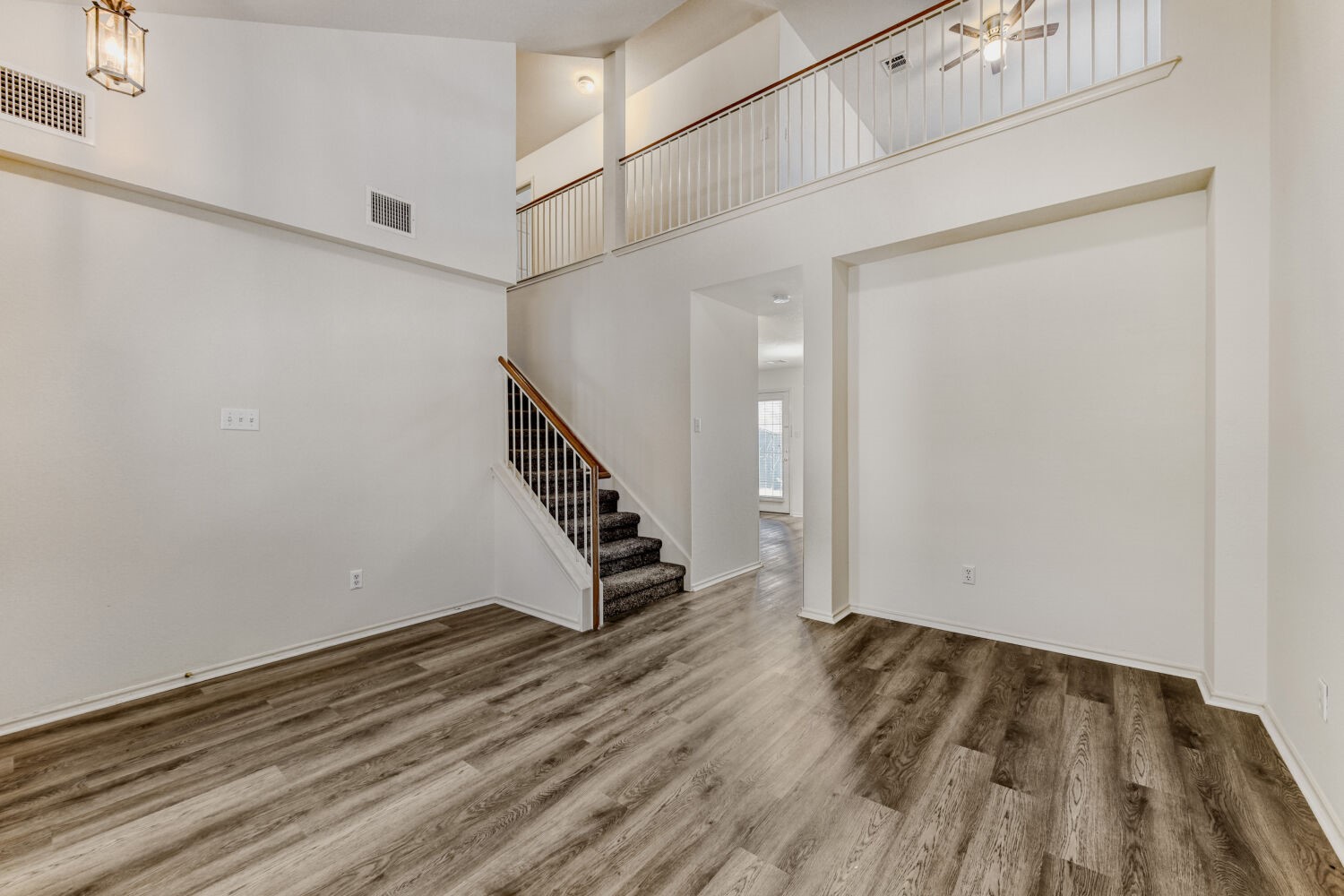 14716 Lipton Lane Pflugerville, TX 78660 - Photo 12 of 26 a view of entryway with wooden floor