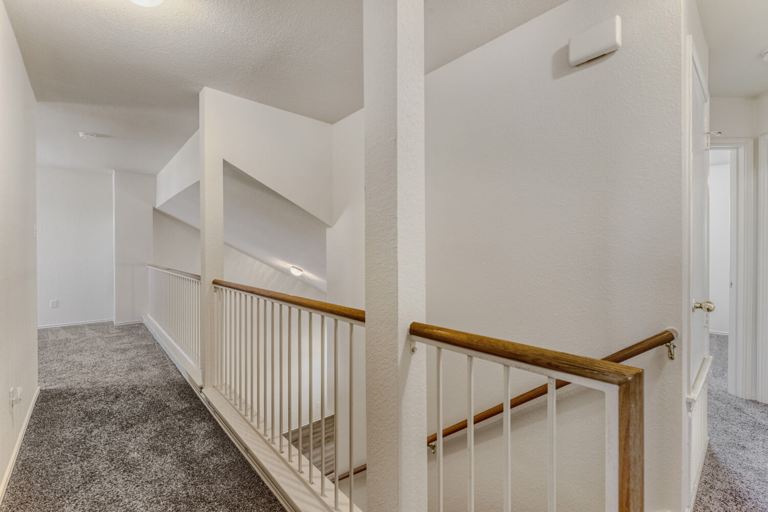 14716 Lipton Lane Pflugerville, TX 78660 - Photo 13 of 26 a view of a hallway with staircase