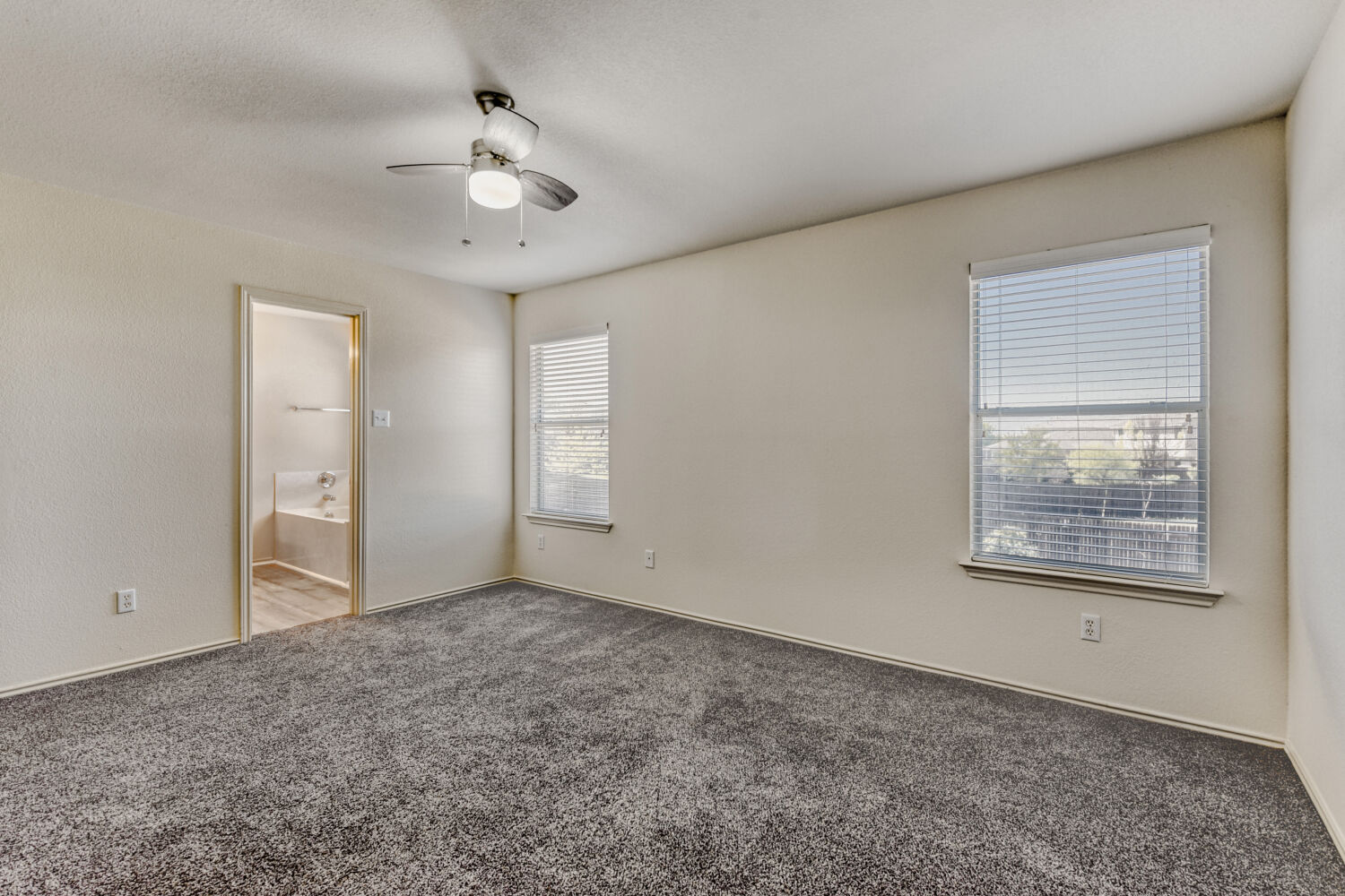 14716 Lipton Lane Pflugerville, TX 78660 - Photo 16 of 26 a view of an empty room with a window