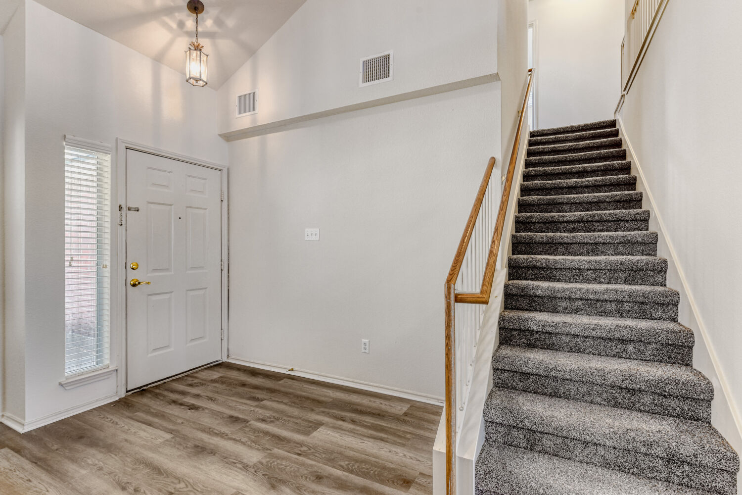 14716 Lipton Lane Pflugerville, TX 78660 - Photo 22 of 26 a view of an entryway with staircase
