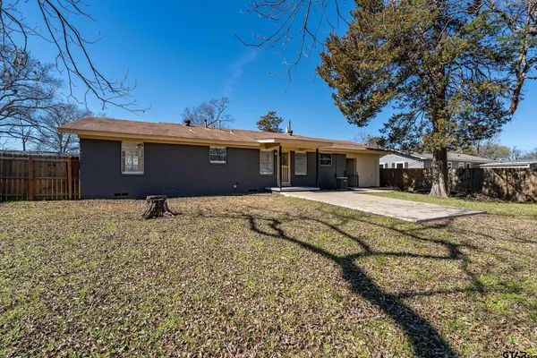 a bathroom with a sink a mirror and a bathtub
