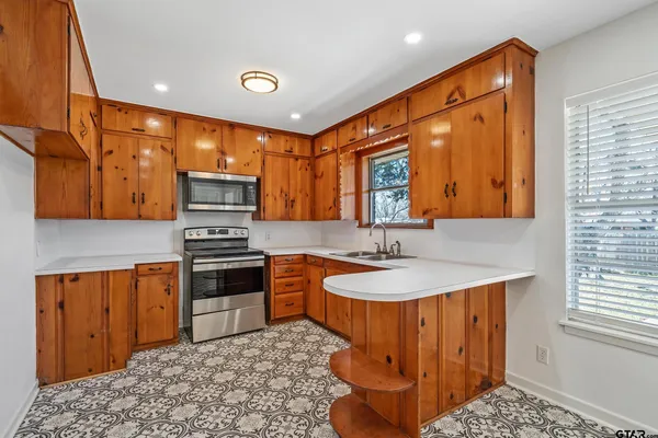 a view of a livingroom with wooden floor