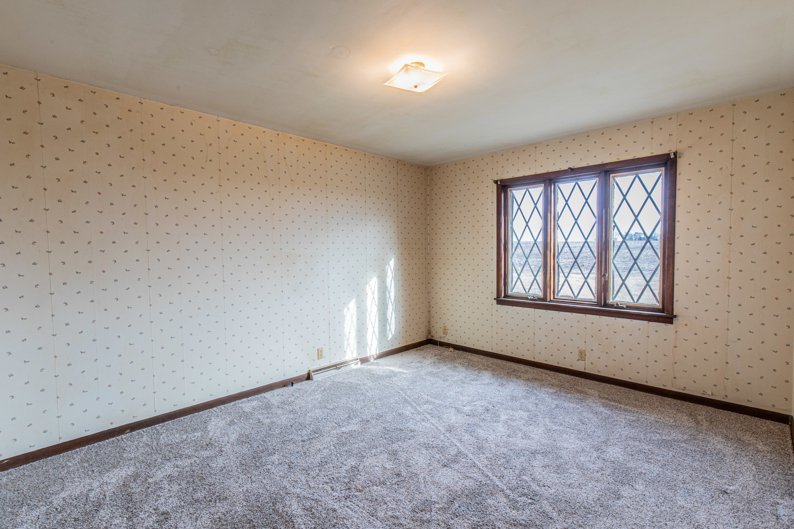 794 Carnahan Road Compton, IL 61318 - Photo 19 of 24 an empty room with windows