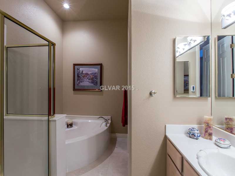 2592 Sun Reef Road Las Vegas, NV 89128 - Photo 20 of 35 Bathroom. Upstairs master bathroom with separate tub and shower