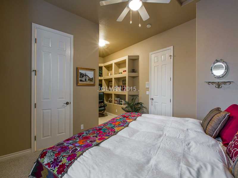 2592 Sun Reef Road Las Vegas, NV 89128 - Photo 21 of 35 Bedroom. Master bedroom upstairs with sitting area, attached bath, and walk-in closet