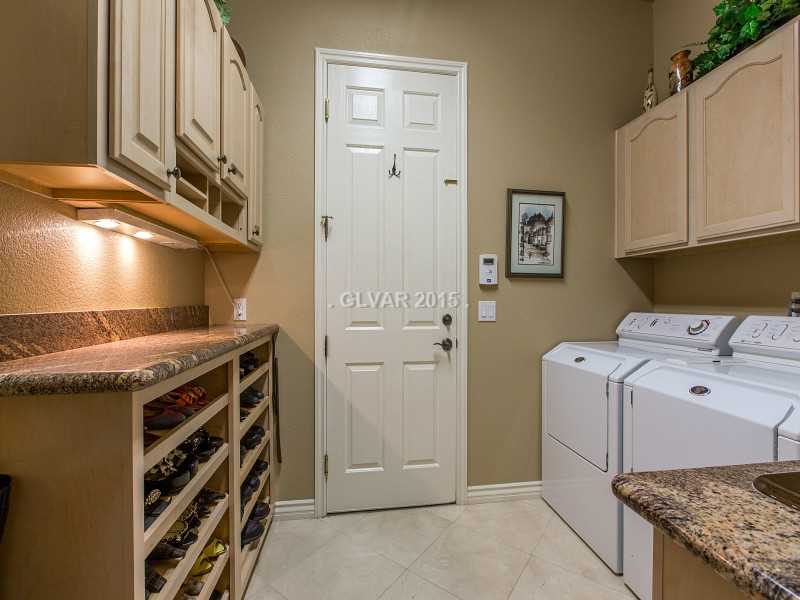 2592 Sun Reef Road Las Vegas, NV 89128 - Photo 10 of 35 Laundry Rm/Area. Awesome storage areas in this well-planned laundry room.