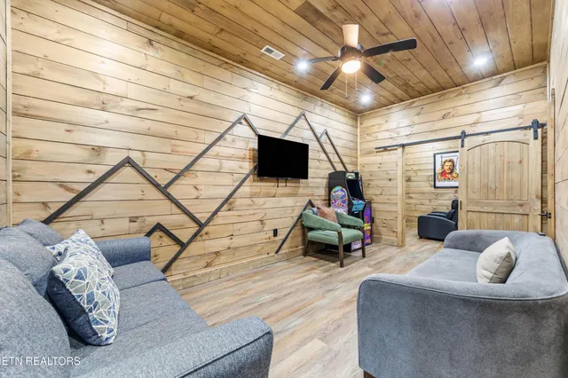 a view of kitchen with granite countertop sink and stove