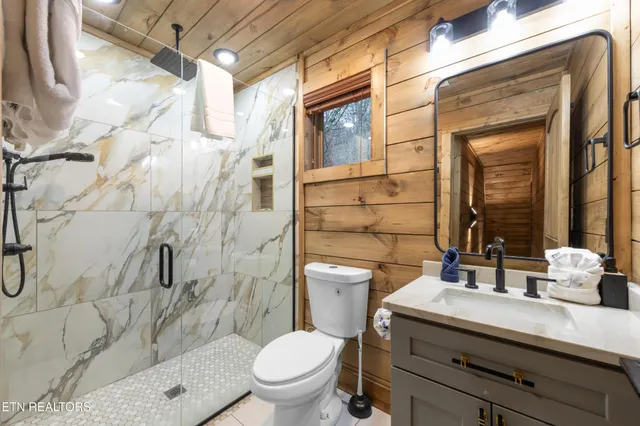 a view of a house with large windows