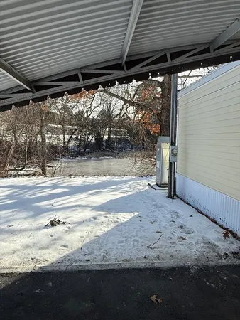 a view of a backyard of the house