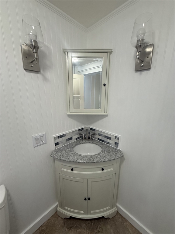 6 Center Street Brimfield, MA 01010 - Photo 4 of 15 a bathroom with a granite countertop sink a mirror and vanity