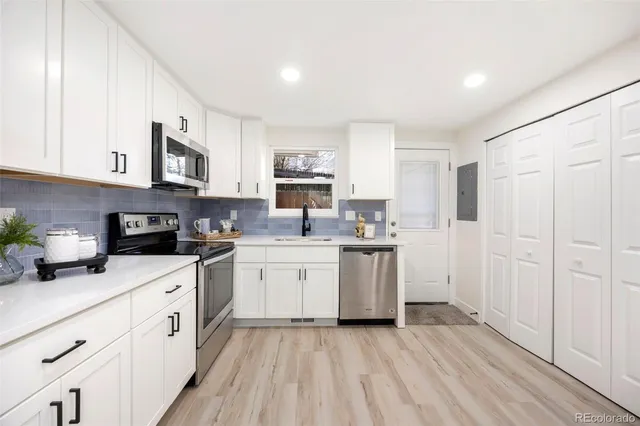 a bedroom with a bed and chair