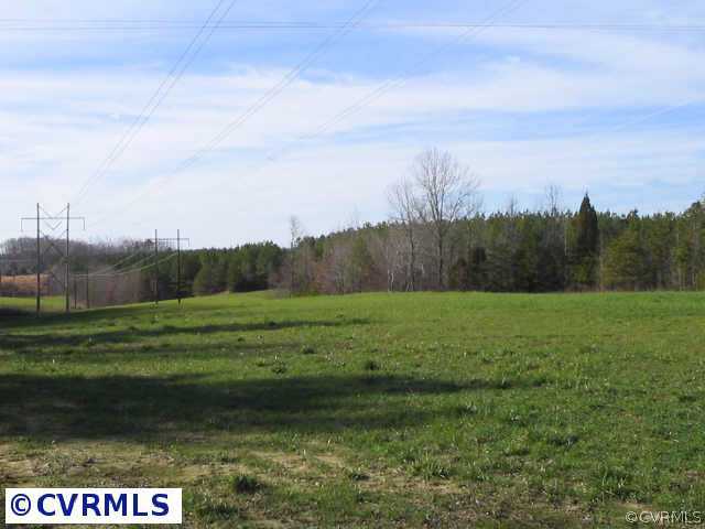 3 Allgood Road Chase City, VA 23924 - Photo 5 of 6 a view of a field of grass and trees
