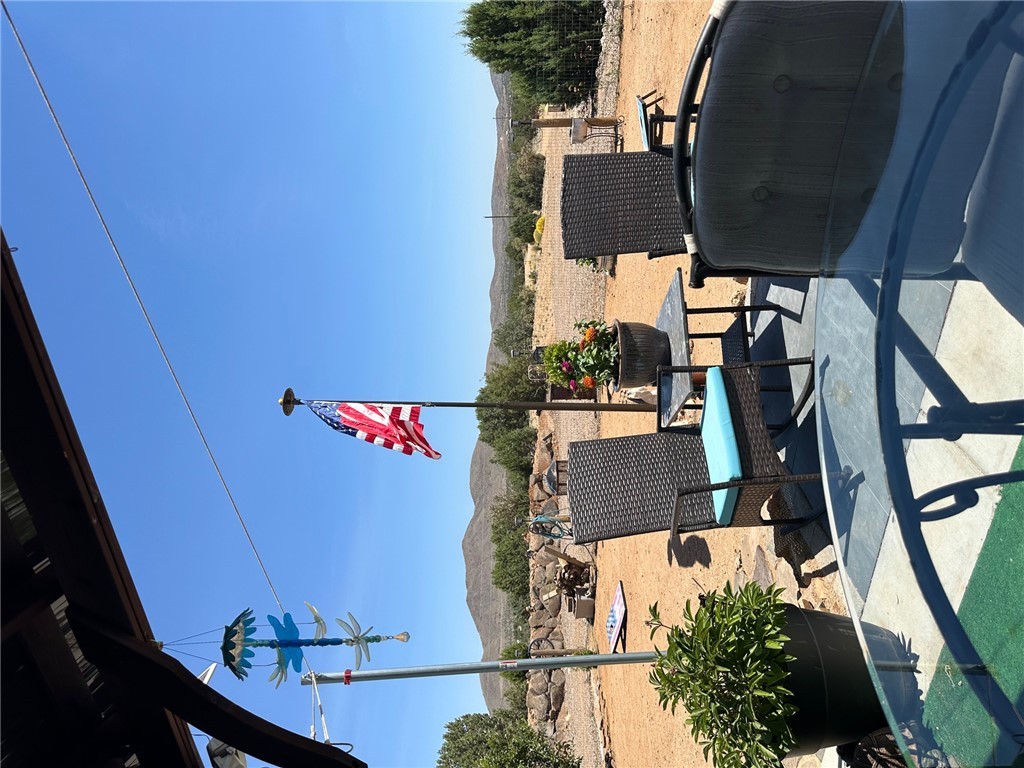 9918 East Blake Ranch Road Kingman, AZ 86401 - Photo 23 of 26 View of patio with a mountain view