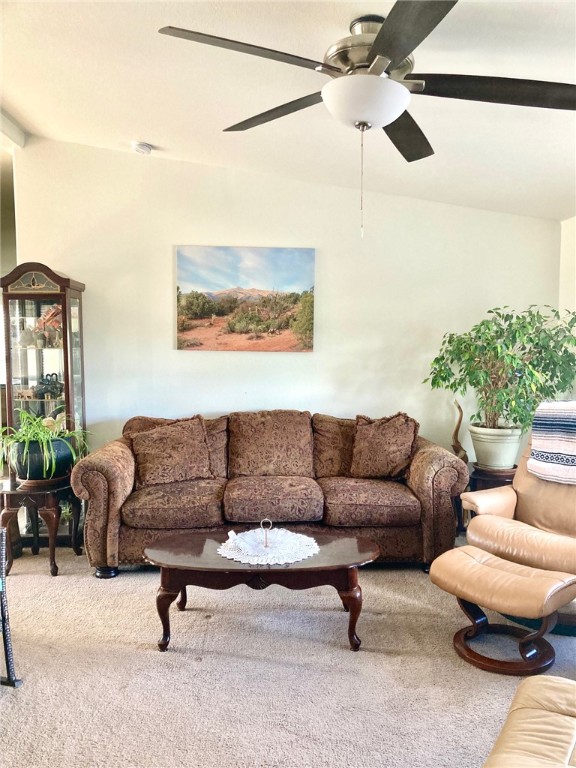 9918 East Blake Ranch Road Kingman, AZ 86401 - Photo 6 of 26 Carpeted living room featuring ceiling fan