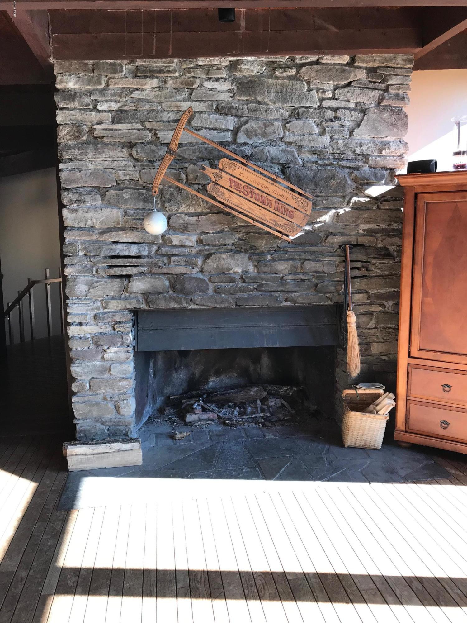 819 Wargo Road Union Dale, PA 18470 - Photo 11 of 49 a view of fireplace and wooden floor