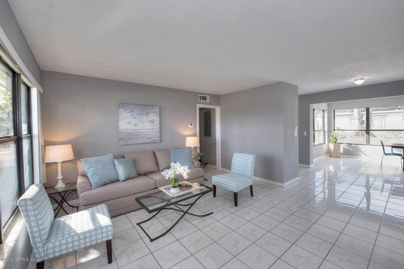 4614 Spring Park Road Jacksonville, FL 32207 - Photo 8 of 23 a living room with furniture and a large window