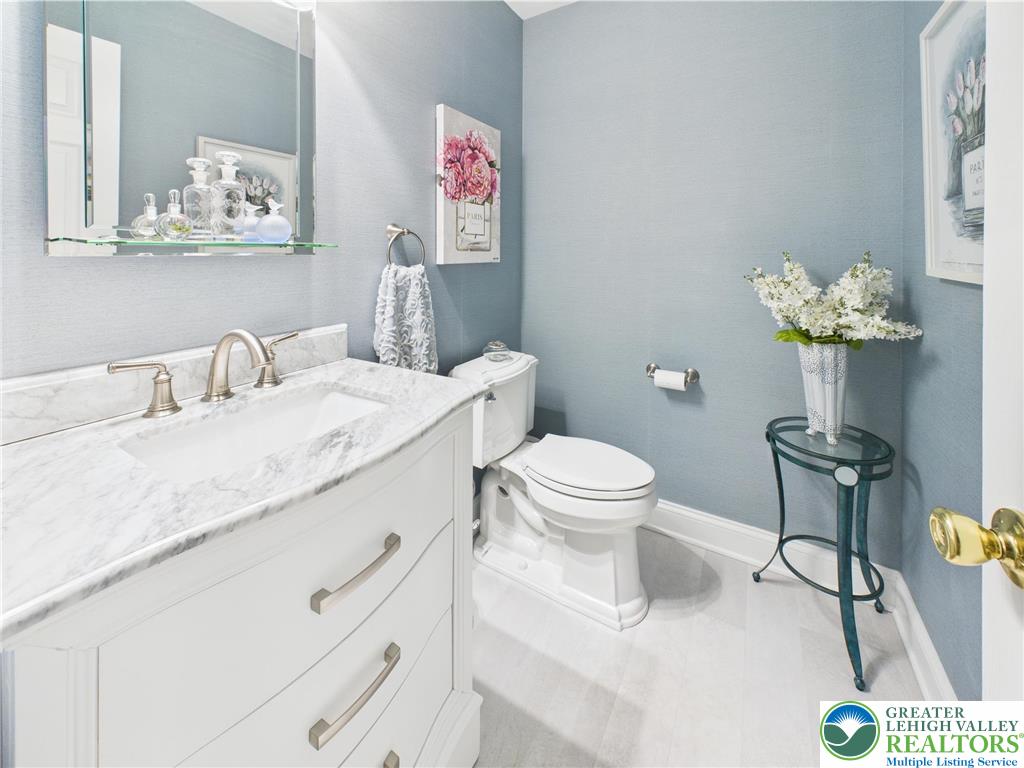 3006 Hope Ridge Drive Easton, PA 18045 - Photo 11 of 21 a bathroom with a toilet sink and mirror