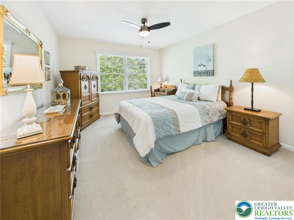 3006 Hope Ridge Drive Easton, PA 18045 - Photo 16 of 21 a spacious bedroom with a bed and wooden floor