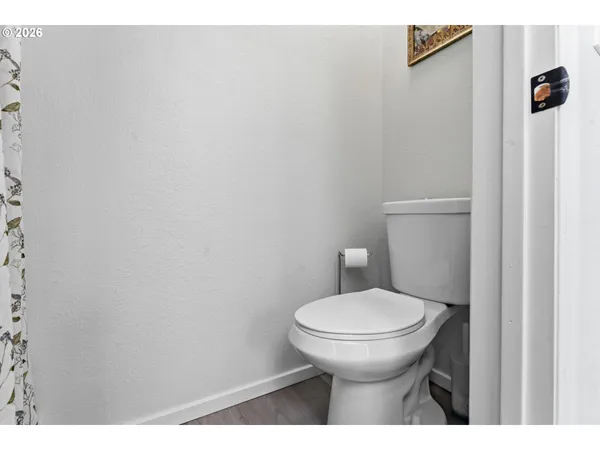 a bathroom with a toilet and a sink