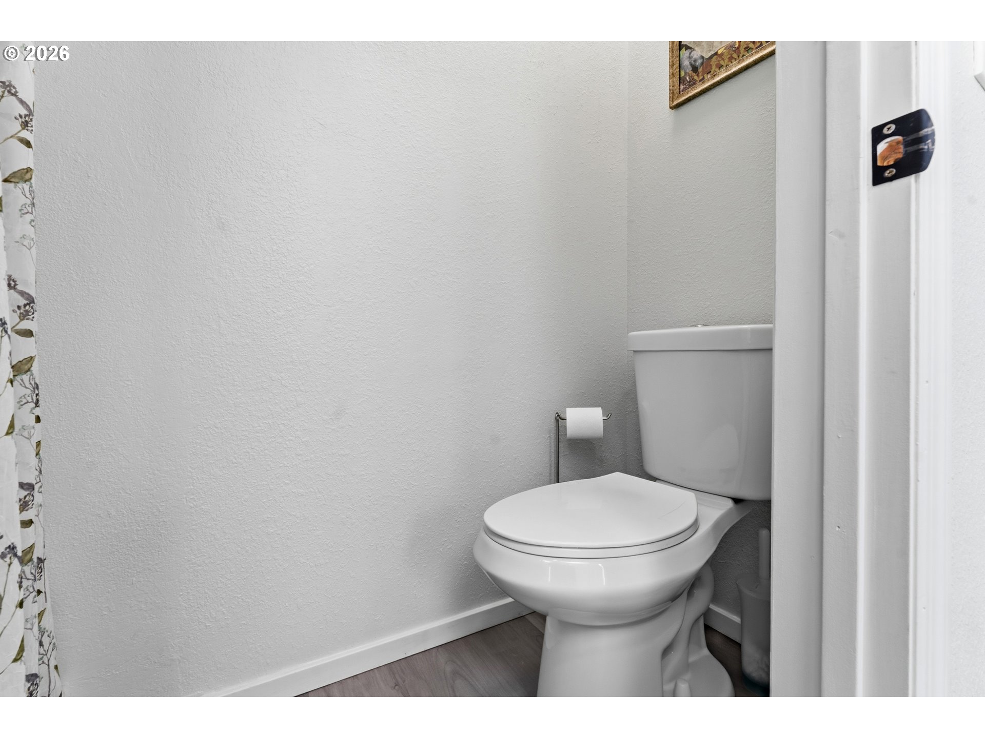 15768 Southeast Powell Boulevard, Unit 40 Portland, OR 97236 - Photo 16 of 33 a bathroom with a toilet and a sink