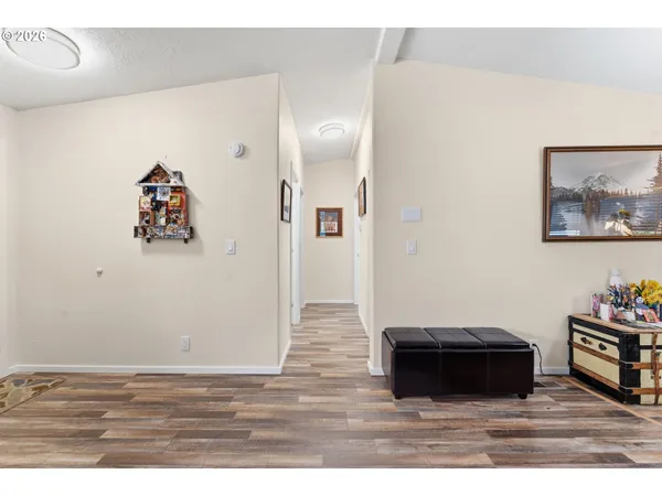 a room with painting and a table