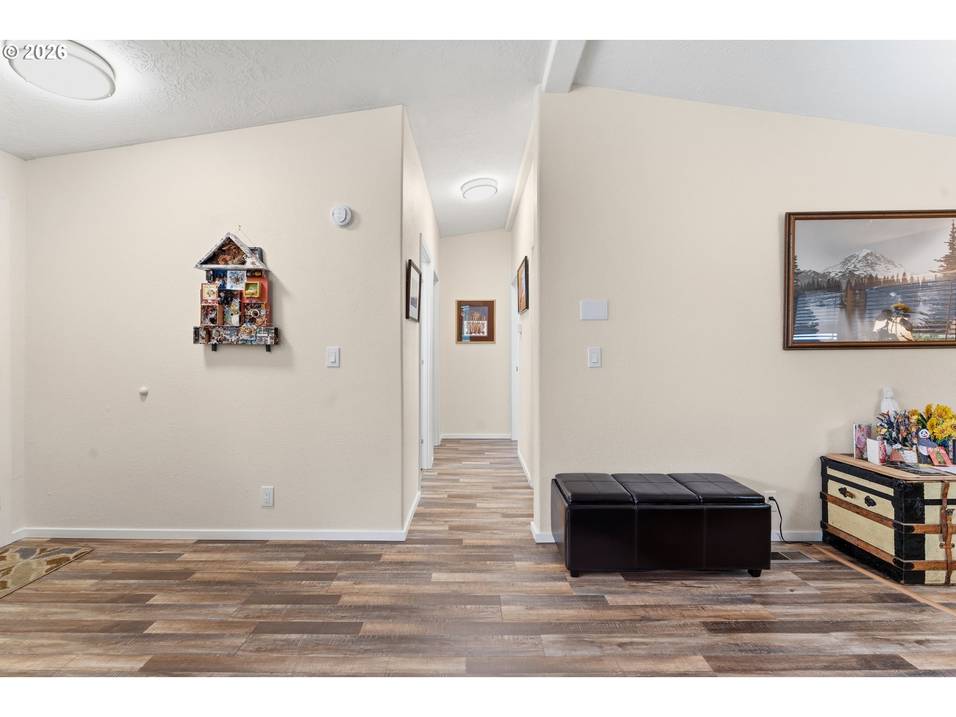 15768 Southeast Powell Boulevard, Unit 40 Portland, OR 97236 - Photo 19 of 33 a room with painting and a table
