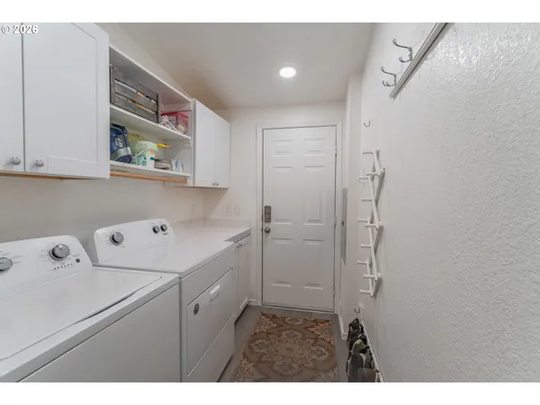a bathroom with a bathtub and a sink