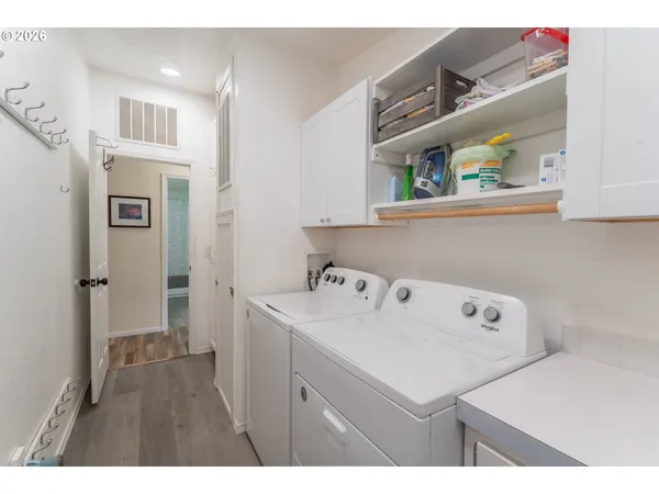 a utility room with dryer and washer