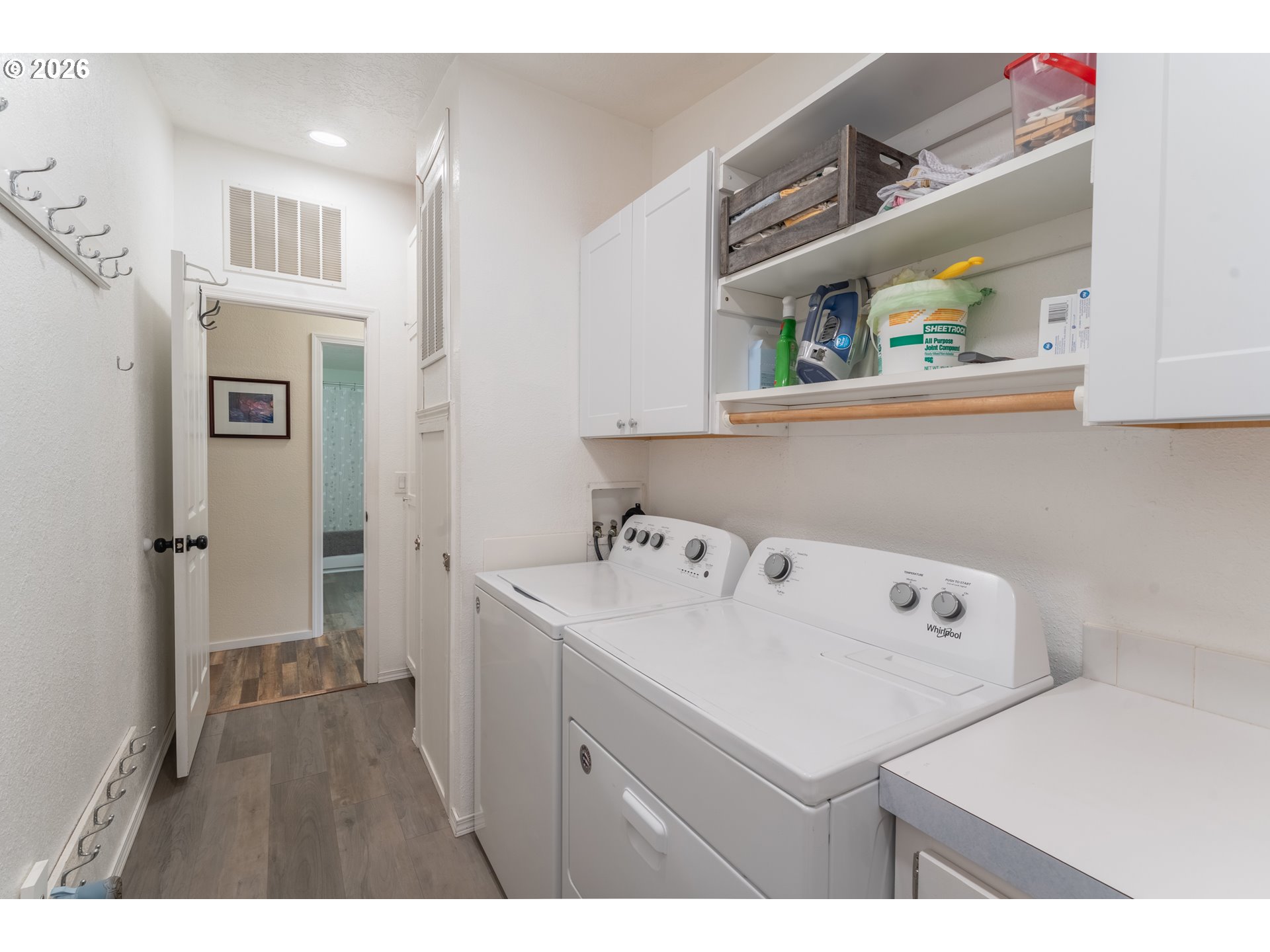 15768 Southeast Powell Boulevard, Unit 40 Portland, OR 97236 - Photo 21 of 33 a utility room with dryer and washer