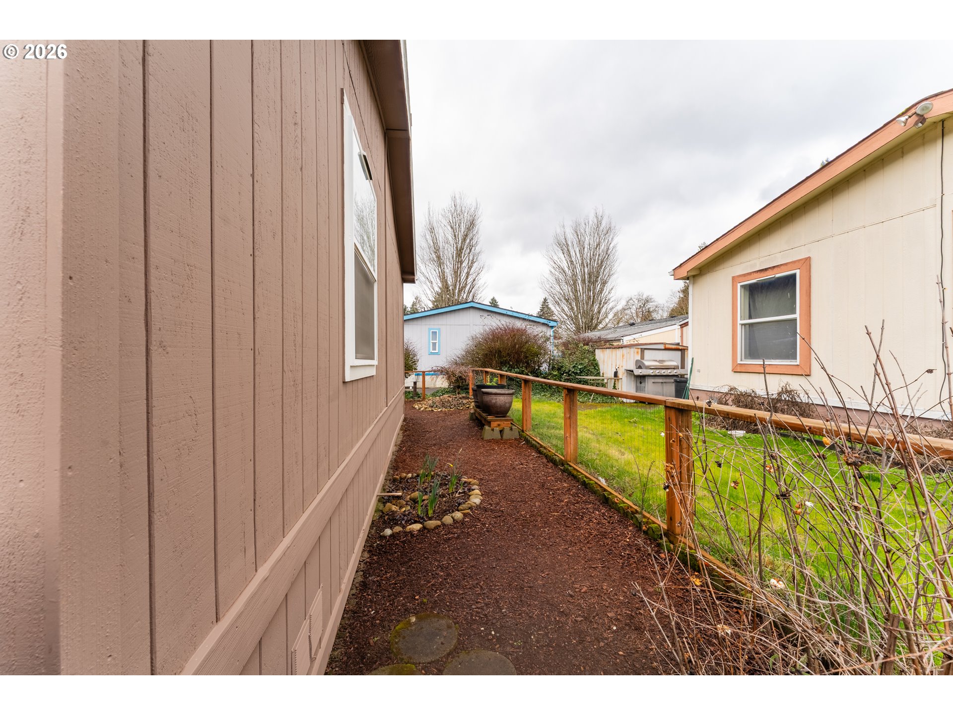 15768 Southeast Powell Boulevard, Unit 40 Portland, OR 97236 - Photo 30 of 33 a view of swimming pool with a patio