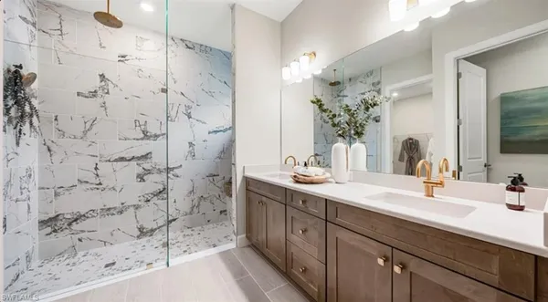 $885,563 | 15681 Genova Drive, Naples, FL 34114