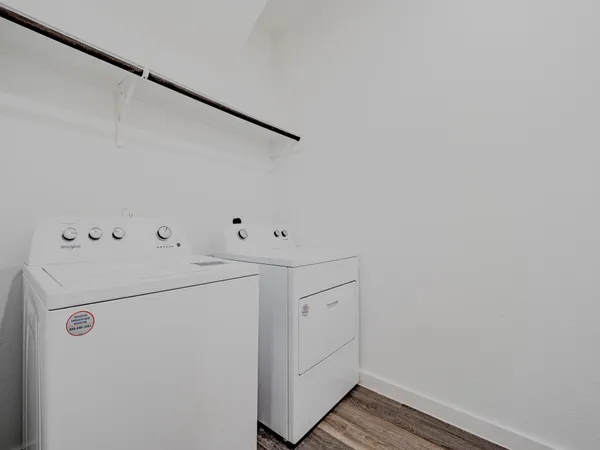 a utility room with dryer and washer