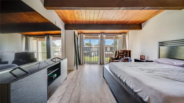 a view of swimming pool from a balcony