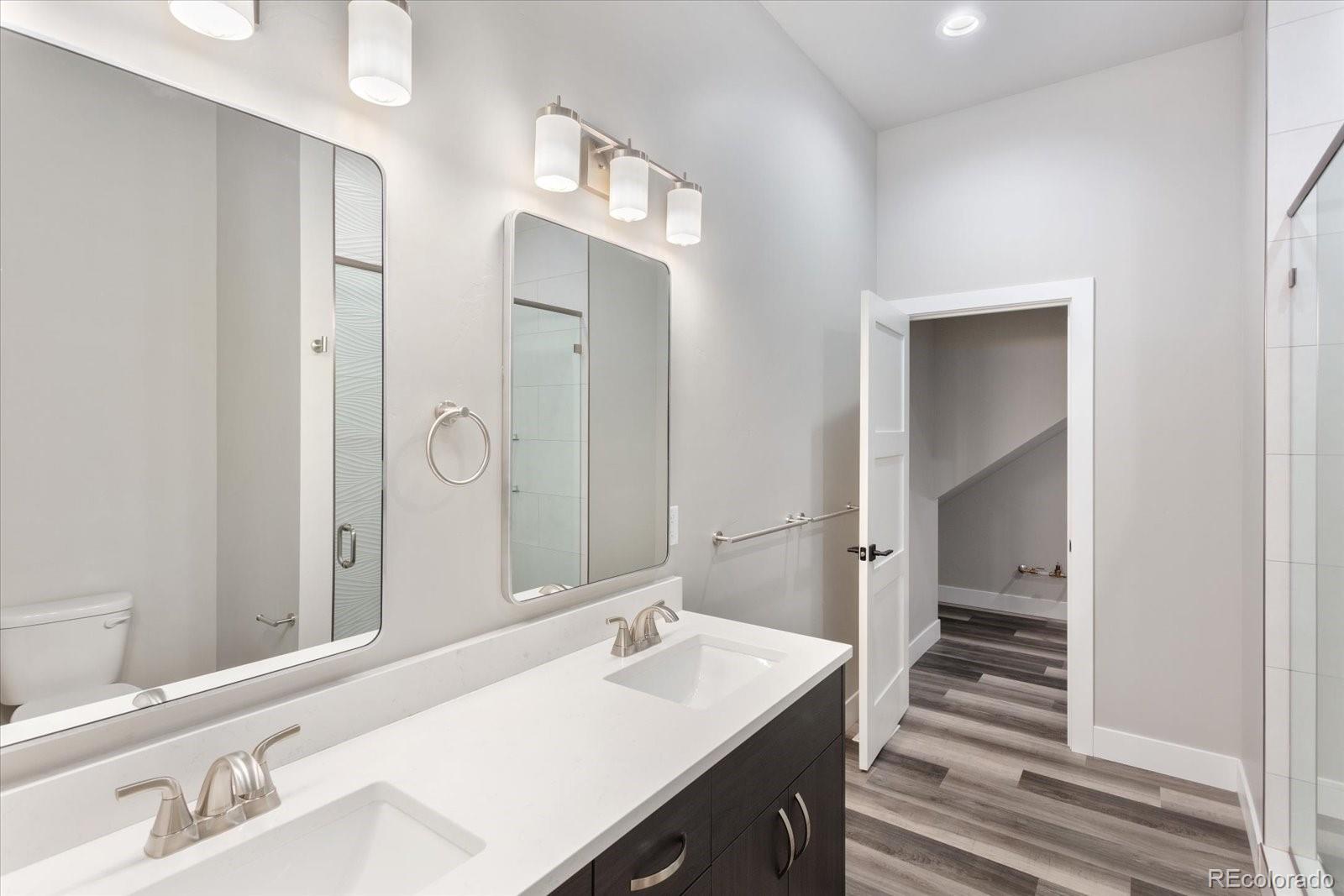 126 Southside Loop Salida, CO 81201 - Photo 15 of 29 a bathroom with a sink and a mirror
