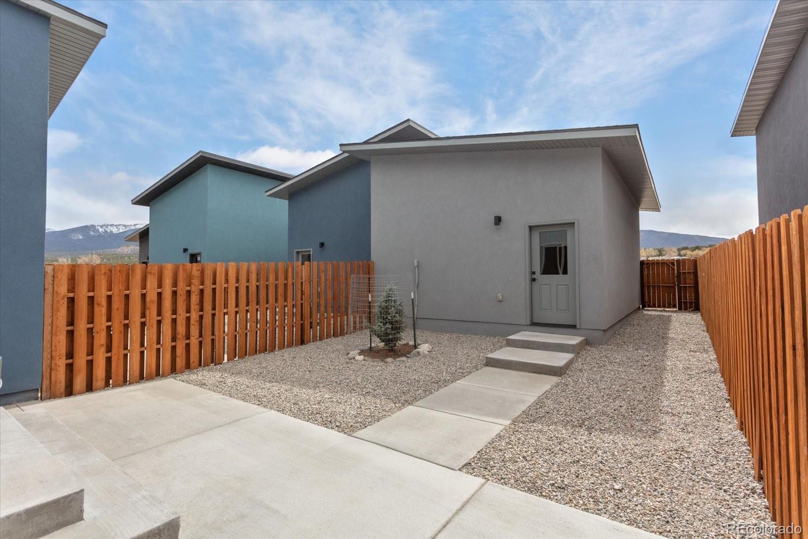 126 Southside Loop Salida, CO 81201 - Photo 8 of 29 a backyard of a house with a garage